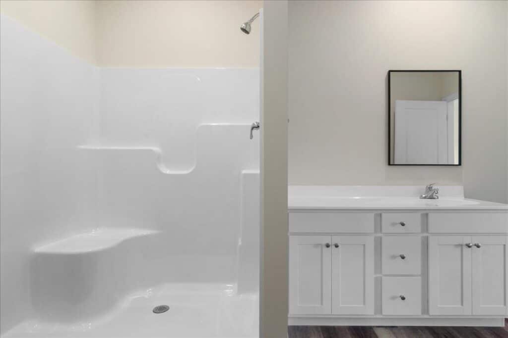 Modern bathroom remodel with sleek shower and stylish vanity for a fresh look.