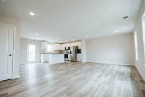 Modern kitchen design featuring stainless steel appliances and spacious, light-filled layout.