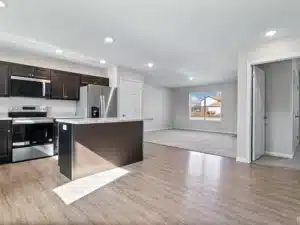 Modern kitchen featuring sleek cabinetry, stainless steel appliances, and open layout design.