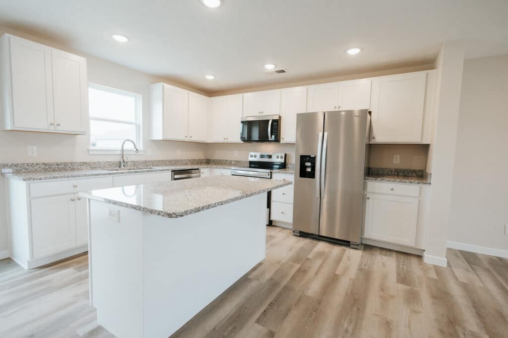 Stylish modern kitchen design with sleek cabinetry and spacious granite countertops.