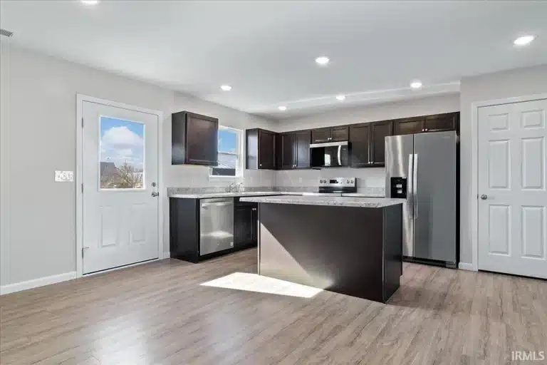 Stylish modern kitchen design with sleek cabinetry and stainless steel appliances.