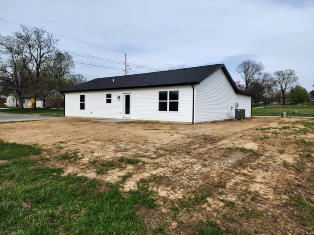 Newly built home with spacious yard and modern design for comfortable living.