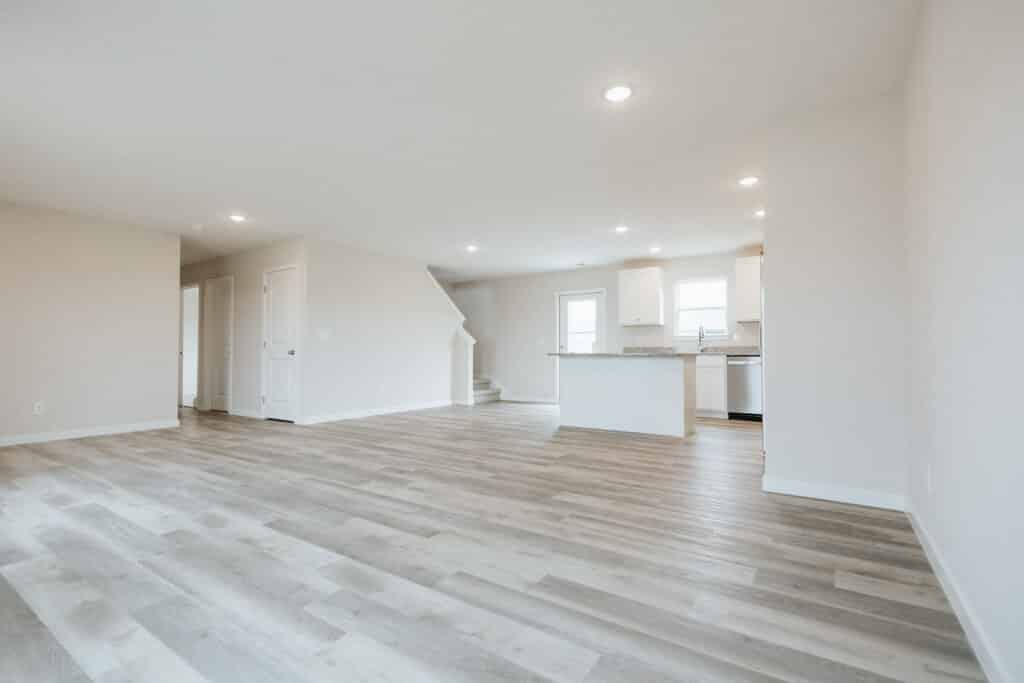 Bright and airy spacious living area with modern kitchen features.