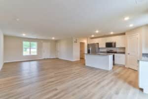 Bright and spacious living room with modern finishes and open layout design.