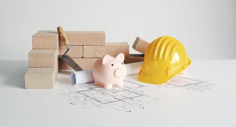 Piggy bank, tools, and blueprints represent saving for construction projects.