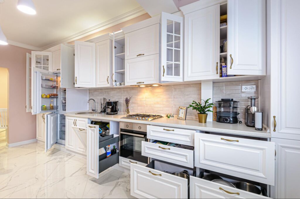 Modern kitchen with cabinets and drawers opened