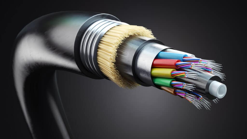 Multimode fiber optic cable structure on a dark background, showcasing modern technology.