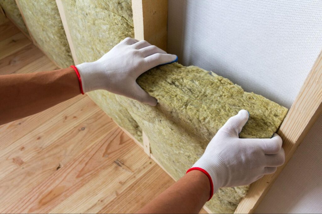 Boost energy efficiency by installing quality insulation in wall cavities.
