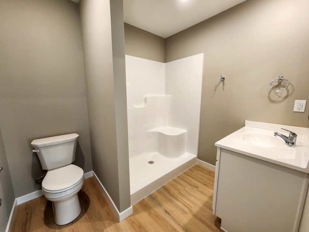 Modern bathroom with sleek fixtures and contemporary design elements.