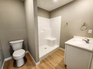 Modern bathroom with sleek fixtures and contemporary design elements.
