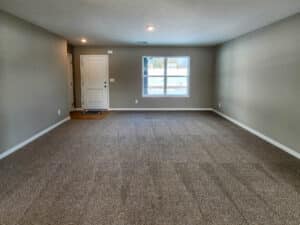 Bright, spacious living room with natural light, perfect for modern design inspiration.