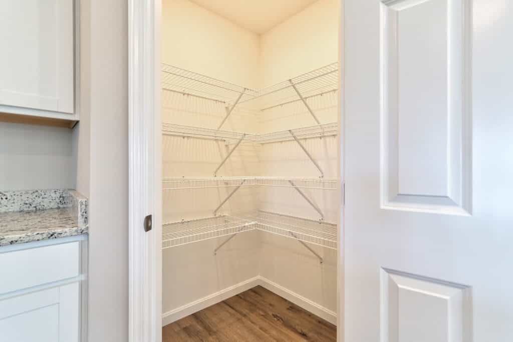 Organized empty pantry with wire shelving for optimal storage solutions.