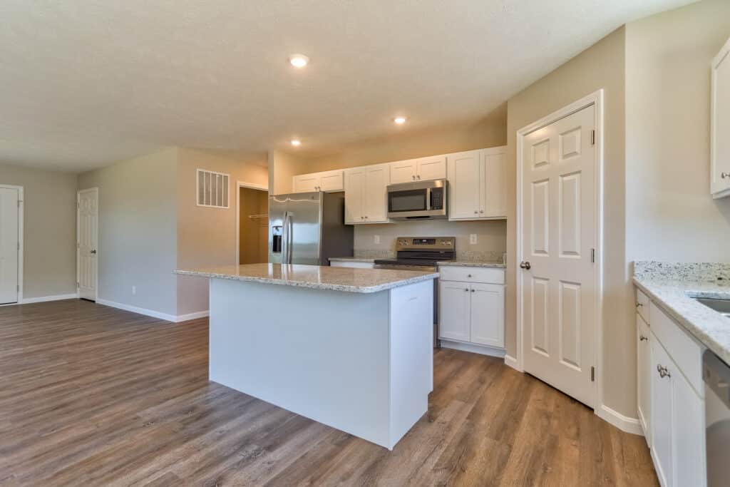Sleek modern kitchen design featuring stainless steel appliances and granite countertops.