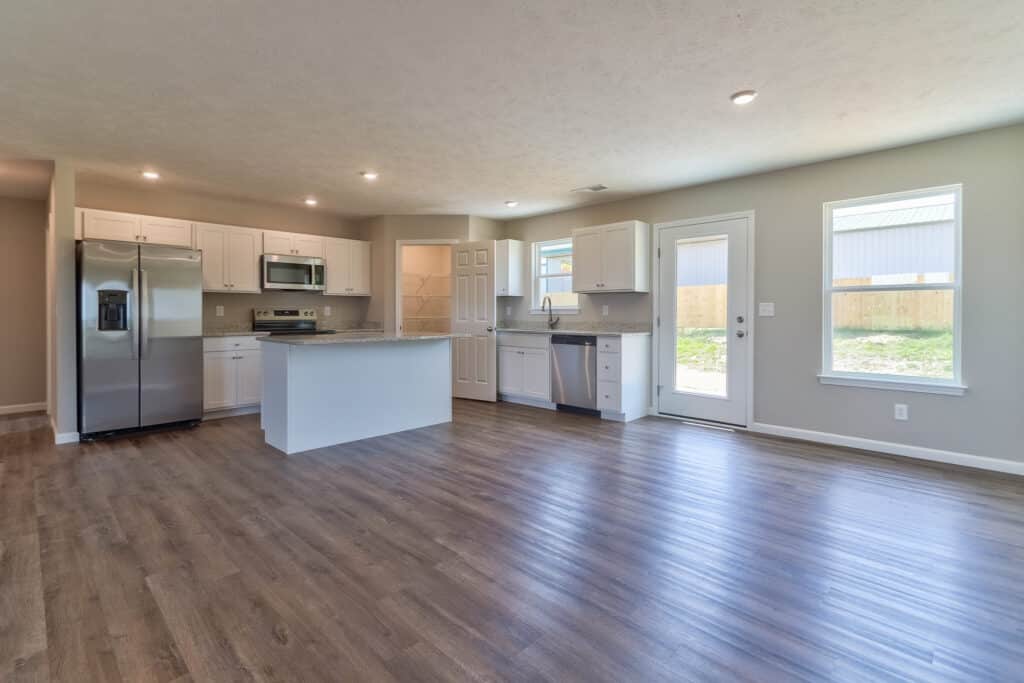 Sleek modern kitchen design featuring stainless appliances and open layout for stylish living.