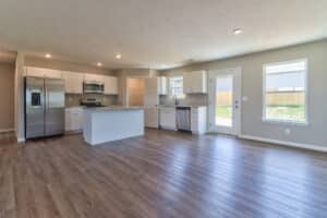 Sleek modern kitchen design featuring stainless appliances and open layout for stylish living.