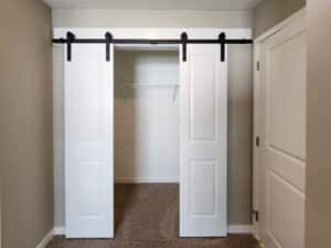 Stylish sliding closet doors add modern elegance to any room’s design.