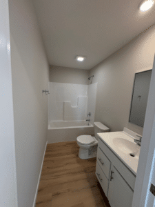 Contemporary bathroom with efficient layout and modern fixtures for stylish living.