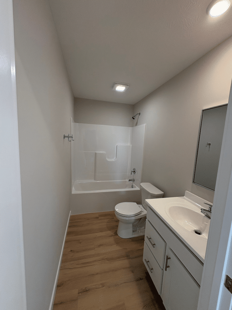 Contemporary bathroom with efficient layout and modern fixtures for stylish living.