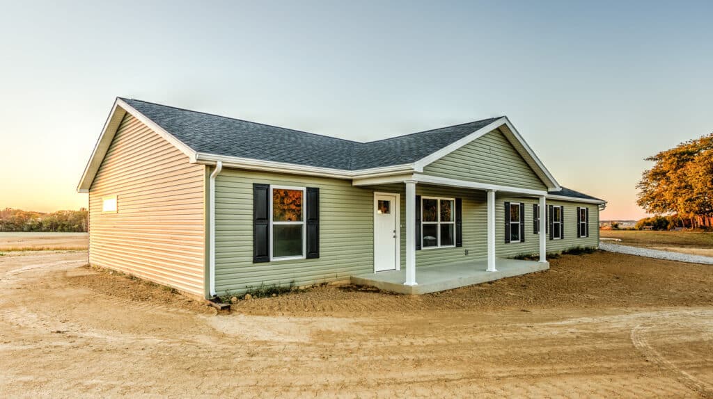 Serene modern home surrounded by nature on a bright sunny day.