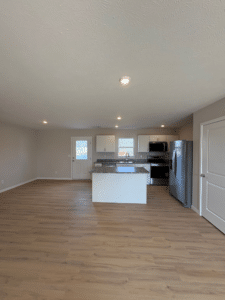 Spacious modern kitchen with bright design and sleek appliances. Perfect for entertaining.