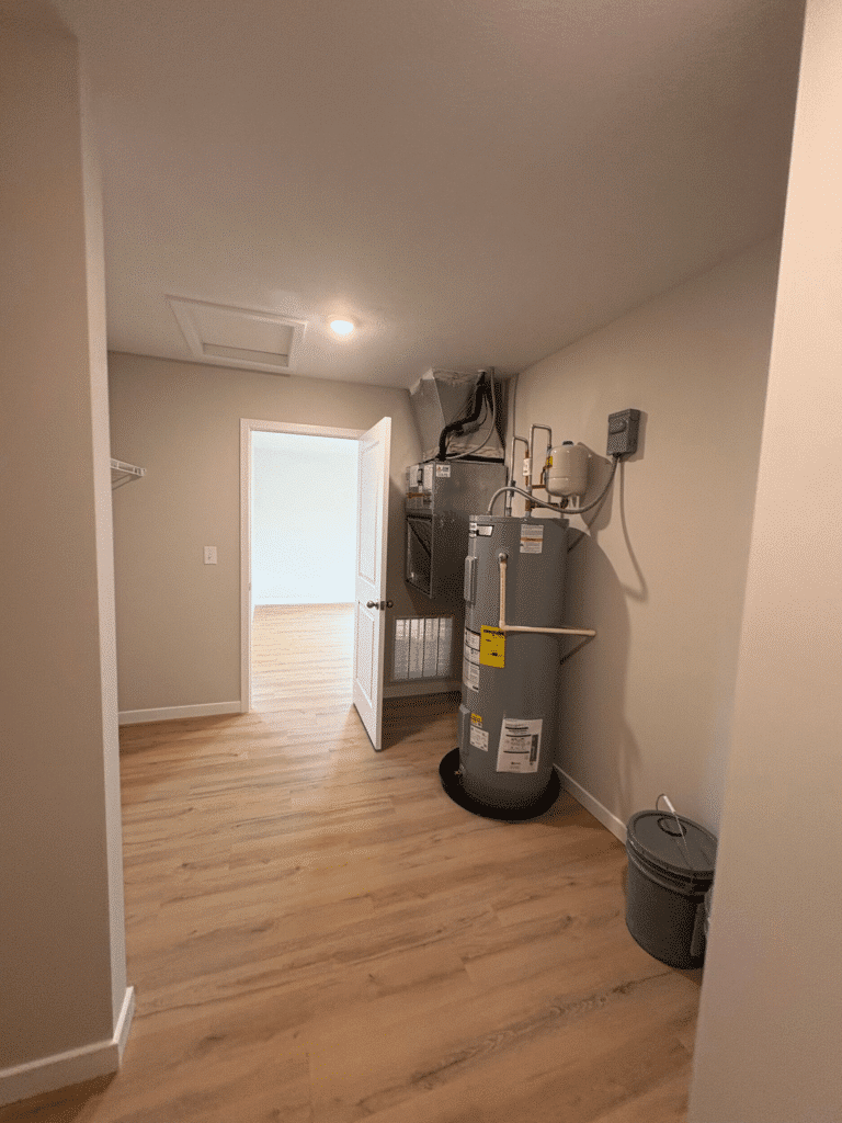 Efficient water heater in a modern utility room with plenty of space.