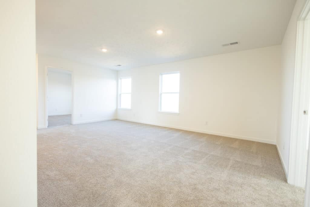 Spacious empty room with natural light, ideal for home decor and design inspiration.