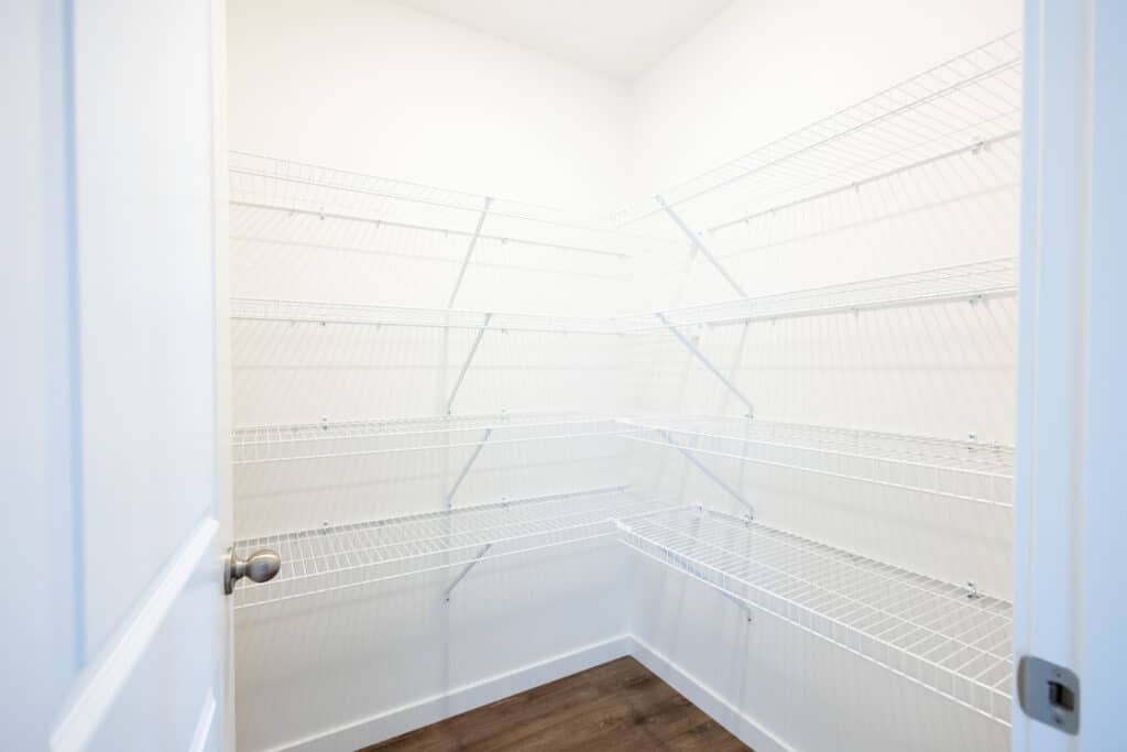 Empty pantry area with wire shelving for organized space and easy access to items.