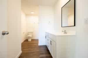 Modern bathroom design featuring sleek cabinetry and contemporary fixtures with clean lines.