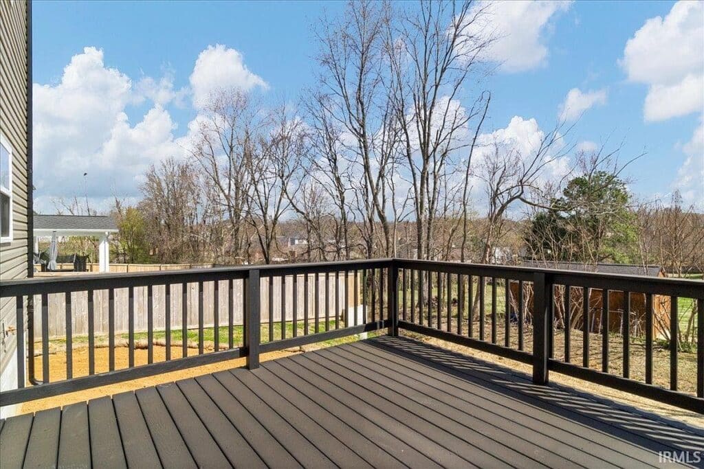 Deck View Spring Clouds Hillside Trl