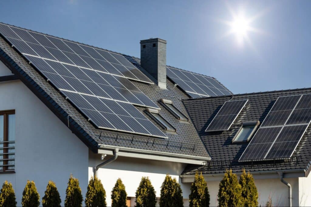 Solar panels installed on a modern home roof harnessing renewable energy.