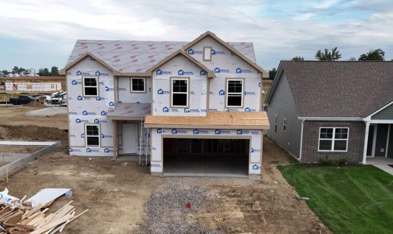 New home construction featuring modern design and exterior finishing in a residential area.